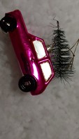 Pink car with Christmas tree on top, glass Christmas tree decoration