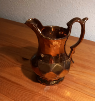 Antique luster-glazed ceramic jug, slightly worn