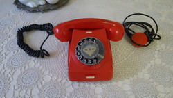 Retro phone with red dial