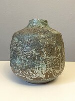 Large retro ceramic vase with a green splattered pattern
