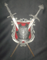 Knight's breastplate with swords. Decorative object that can be hung on the wall