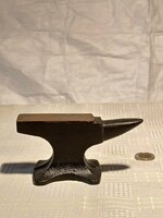 A small iron anvil