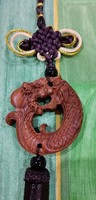 Real term. Feng shui rosewood pendant, amulet, protection symbol