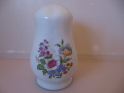 Chiseled porcelain salt shaker with flower bouquet pattern