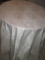 Beautiful snow-white huge antique elegant damask tablecloth with aster pattern