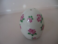 Egg-shaped porcelain salt shaker with a rose pattern