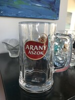 About 0.6 liter beer mug, thick glass, gold aces inscription, in good condition