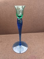 Beautiful graceful thin glass vase with a blue-green transition