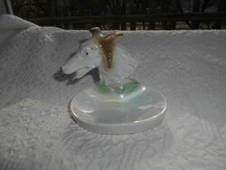 Art deco style porcelain ashtray with a dog figure on the side