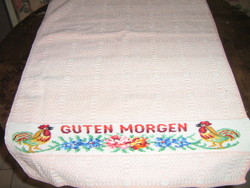 Charming pink towel with rooster and flower pattern