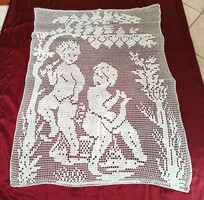 Musical putts - antique crocheted curtain