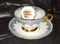 Gilded tea cup with bottom.