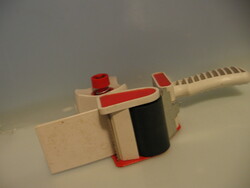 Adhesive tape dispensing gun