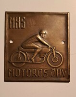 Art deco motorized bronze plate badge mhs. 1950. Size: 52x48 cm.