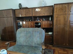 Cabinet line with intarsia decoration.