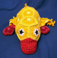 Unique crocheted stuffed duck with an African flower pattern