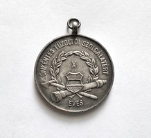 Medal for 10 years of voluntary fire service in 1958.