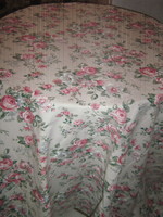 A pair of beautiful vintage-style blackout curtains with a rose pattern