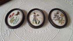 3 hand-sewn, embroidered small oval framed pictures.