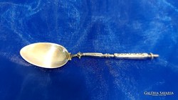 Old, thick silver-plated spoon.