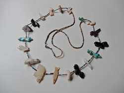 Old Navajo necklace carved from various minerals with a silver lock