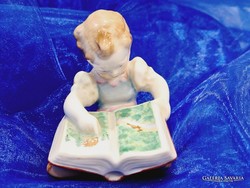 Herend porcelain, little girl reading a storybook.