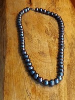 Black pearl (cultured) necklace, ring, earrings. From Bali.
