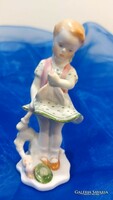Herend porcelain girl with doll.