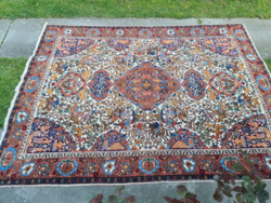 Antique animal hand-knotted rug
