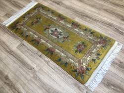 Chinese hand-knotted wool rug, 60 x 143 cm