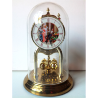 Table clock with rotating pendulum, hammering, baroque pattern