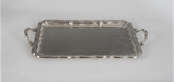 Silver tray with ribbon decoration
