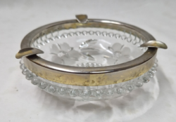 Old, metal-rimmed, polished, crystal ashtray in perfect condition