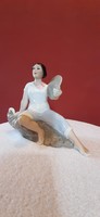 Porcelain statue. Lady on a Rock. Hand-painted statue, 15.5 cm high. Presumably North Korean.