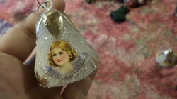 A retro Christmas tree decoration made of some kind of foamed plastic. Very nostalgic, but not antique.
