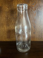 Old ribbed neck milk bottle / pasteurized milk