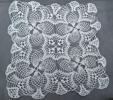 Old lace tablecloth, needlework, porcelain, decorative object under porcelain 25 x 25 cm.