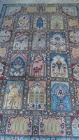 Hand-knotted windowed oriental wool rug in good condition