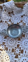 Pewter - probably - a small wine tasting bowl