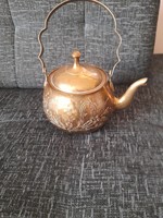 Tea pot with engraved decoration