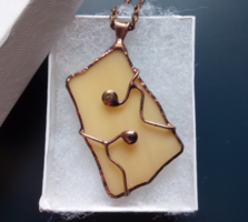 Handmade beige glass pendant with copper wire decoration