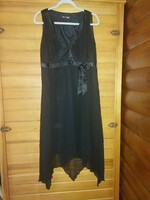 Fekete aszimmetrikus alkalmi ruha. Újszerű. Mell:50-60cm-ig nyílik, derék:50cm.
