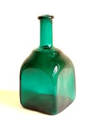 Old dark turquoise green colored square tweezers in the shape of blown glass bottles are beautiful for decoration