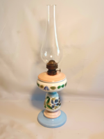 Torn glass kerosene lamp