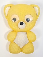 Plastic teddy bear with retro traffic sign and moving eyes