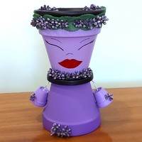 Purple organ clay doll