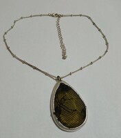 Retro fashion necklace - on a silver-colored chain with an interesting pendant in the shape of a drop