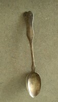 Silver slide-marked teaspoon