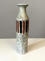 Illés retro ceramic vase on a white background with a striped pattern with a small lack of glaze at the bottom