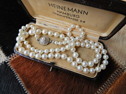 Is it real freshwater? String of pearls with 8 carat art deco style gold clasp